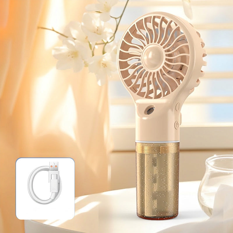 🌫️ Finom nano-köd és hűvös szellő egyben – ez a kézi ventilátor egyszerre csökkenti a hőmérsékletet és hidratálja a bőröd! 🔥→❄️
