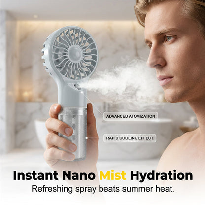 🌫️ Finom nano-köd és hűvös szellő egyben – ez a kézi ventilátor egyszerre csökkenti a hőmérsékletet és hidratálja a bőröd! 🔥→❄️