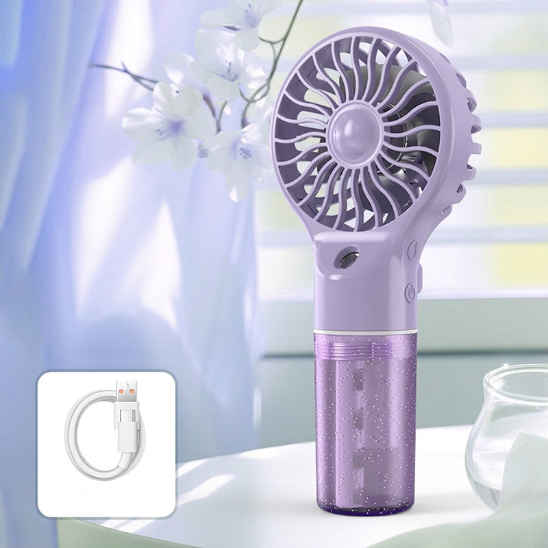 🌫️ Finom nano-köd és hűvös szellő egyben – ez a kézi ventilátor egyszerre csökkenti a hőmérsékletet és hidratálja a bőröd! 🔥→❄️
