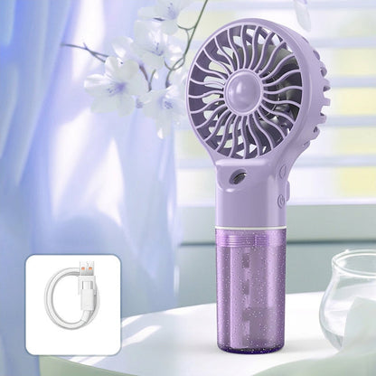 🌫️ Finom nano-köd és hűvös szellő egyben – ez a kézi ventilátor egyszerre csökkenti a hőmérsékletet és hidratálja a bőröd! 🔥→❄️